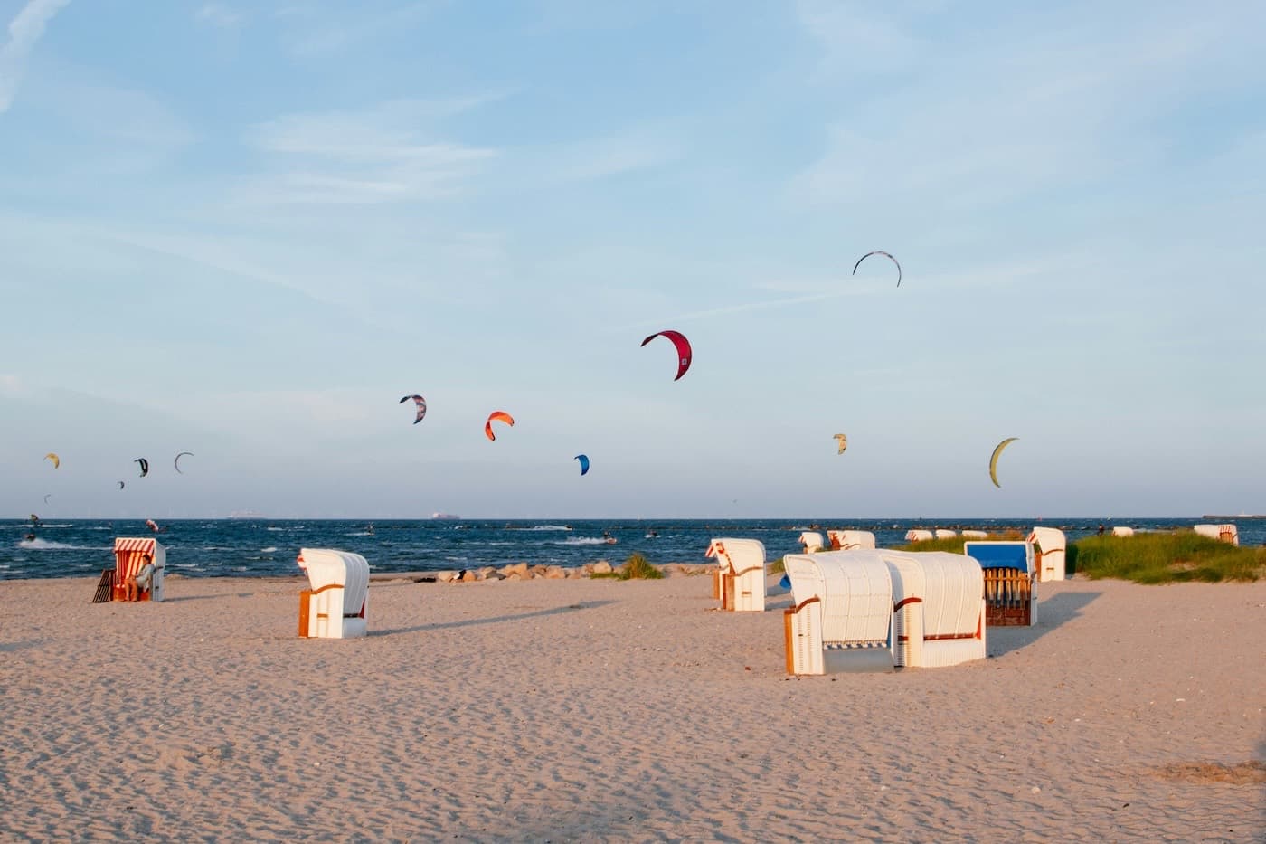 Kitesurfers on a shallow Baltic bay on the island of Fehmarn in northern Germany