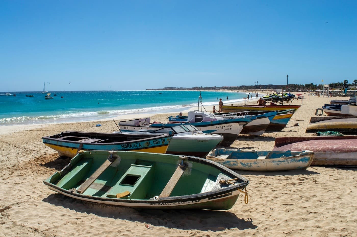 Kitesurfers riding the cross-onshore bay at Kite Beach near Santa Maria on Sal, Cape Verde